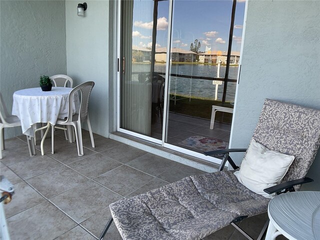 3310 Loveland Blvd Unit 604, Port Charlotte, FL 33980 - balcony featuring a water view