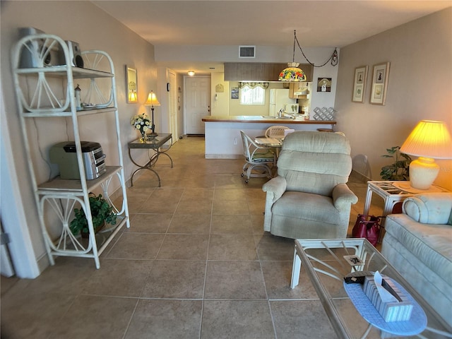 tiled living room with sink