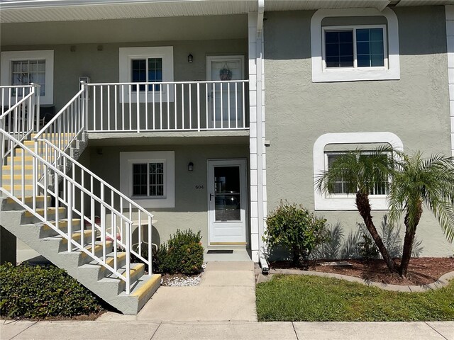 3310 Loveland Blvd Unit 604, Port Charlotte, FL 33980 - view of building exterior with stairway