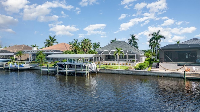 view of dock featuring a water view and glass enclosure