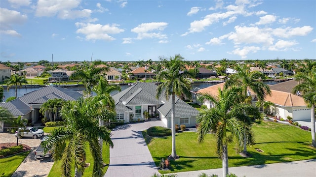 drone / aerial view featuring a water view