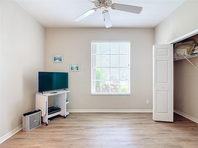 bedroom featuring a closet, ceiling fan, and light hardwood / wood-style floors