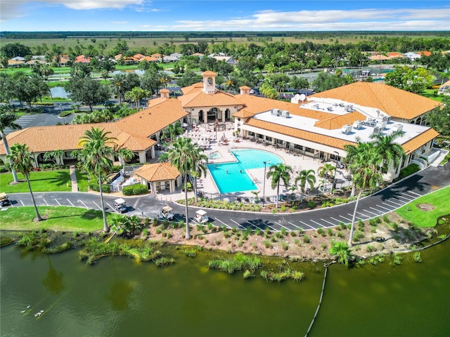 drone / aerial view with a water view