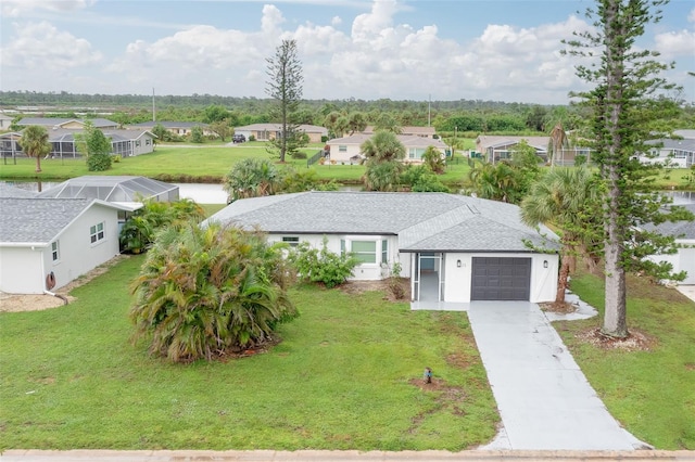 view of front facade featuring a front yard, a garage, and a lanai