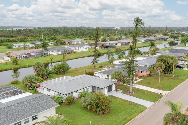 25 Caddy Rd, Rotonda West, FL 33947 - aerial perspective of suburban area with a large body of water