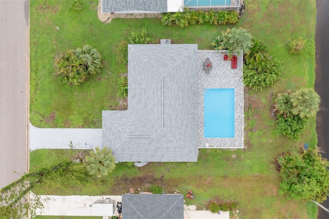 25 Caddy Rd, Rotonda West, FL 33947 - view of subject property featuring a pool