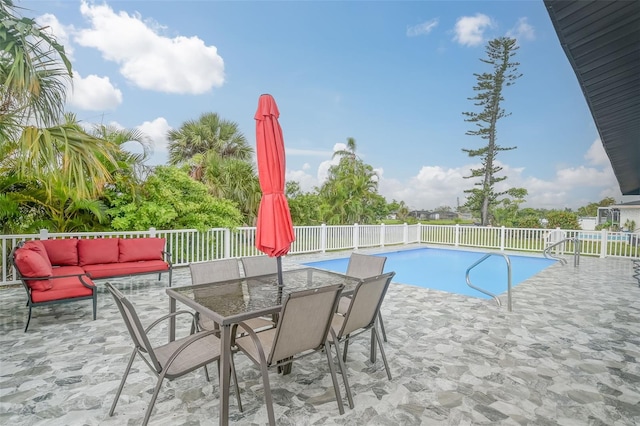 25 Caddy Rd, Rotonda West, FL 33947 - view of swimming pool with a patio and outdoor lounge area