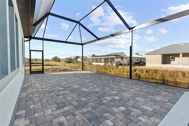 view of patio / terrace with glass enclosure