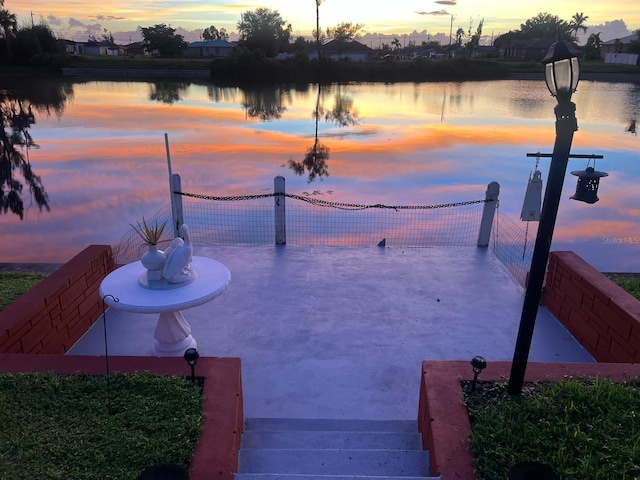 dock area with a water view