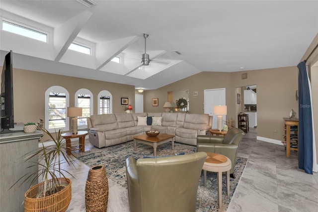 living room featuring lofted ceiling and ceiling fan