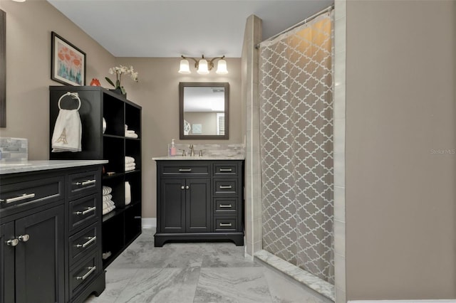 bathroom featuring vanity and curtained shower