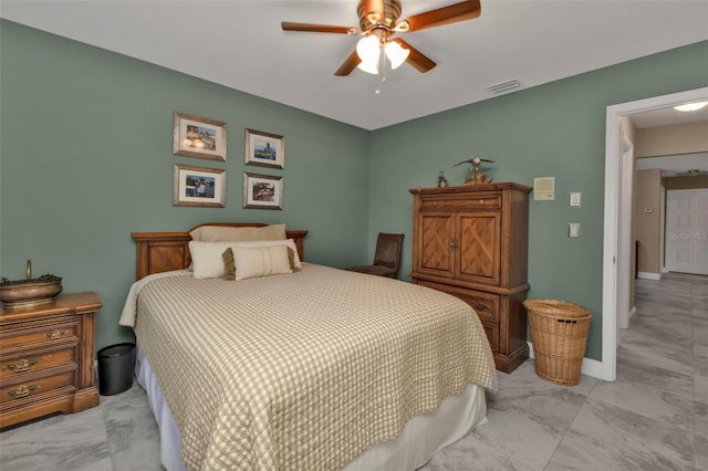 bedroom featuring ceiling fan