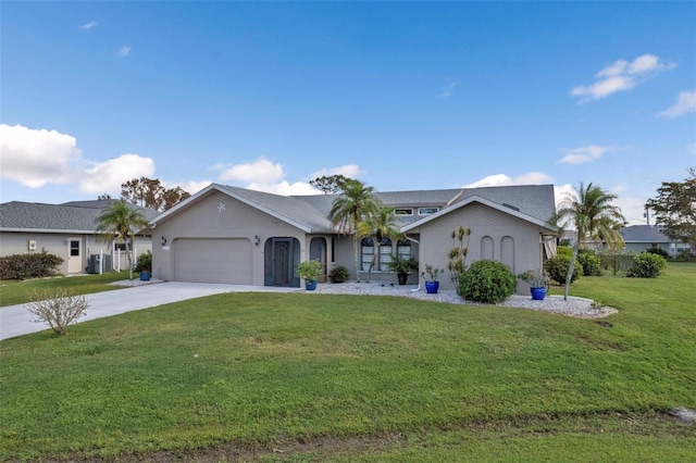 ranch-style house with a garage and a front lawn