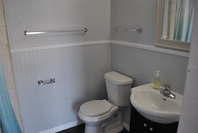 bathroom with vanity and toilet