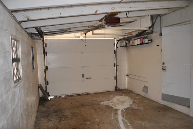 garage featuring a garage door opener