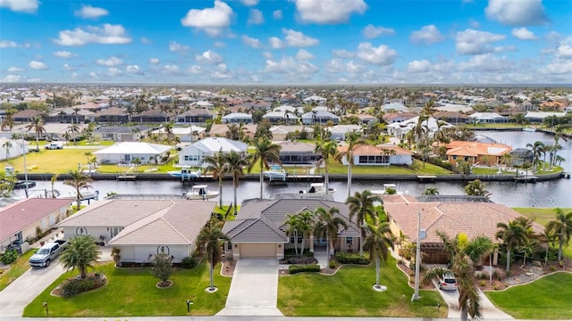 drone / aerial view featuring a water view