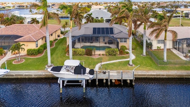 birds eye view of property featuring a water view