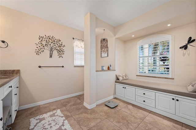 bathroom with vanity and tile patterned floors