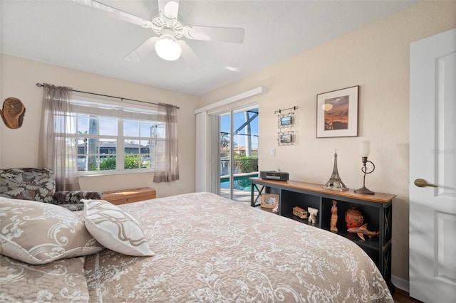 bedroom with access to exterior and ceiling fan