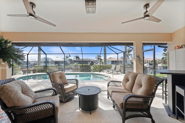 interior space with ceiling fan