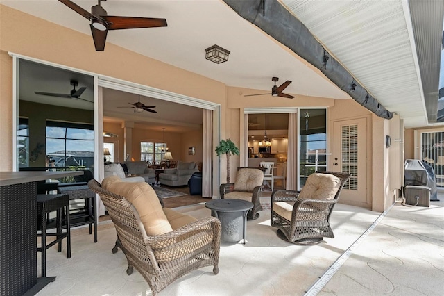 view of patio with ceiling fan