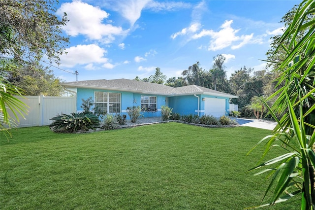 view of front facade featuring a front yard and a garage