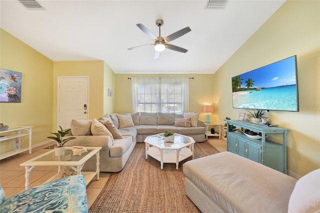 tiled living room with vaulted ceiling and ceiling fan