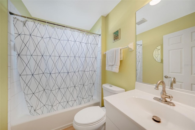 full bathroom featuring shower / bath combo, toilet, and vanity