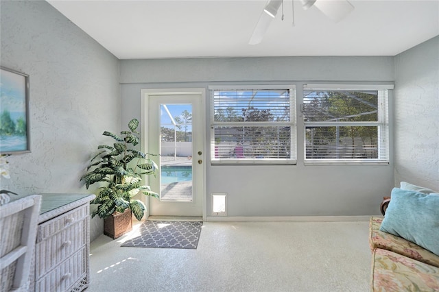 entryway with carpet flooring