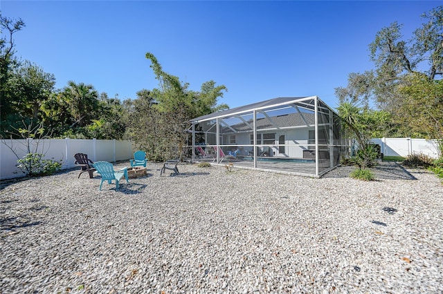 back of house featuring a lanai