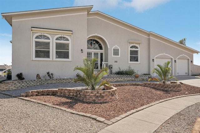 view of front of home with a garage