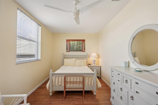 bedroom with ceiling fan and hardwood / wood-style floors