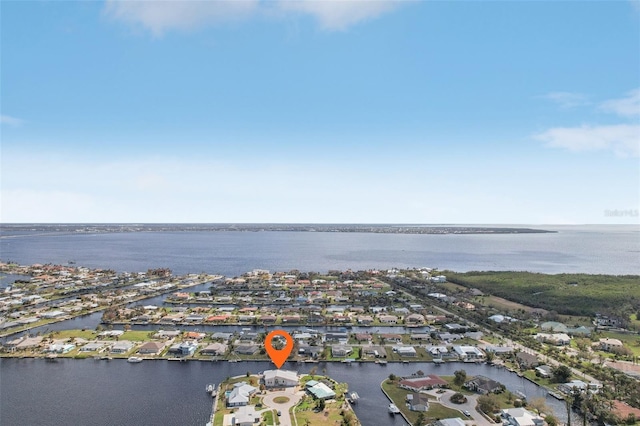 aerial view with a water view and a residential view