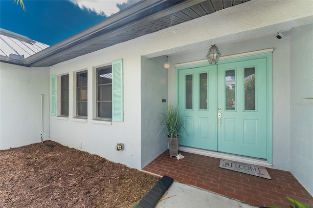 view of exterior entry with french doors