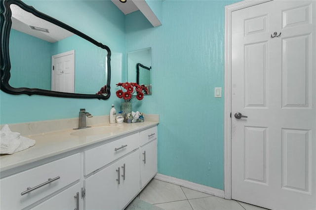 bathroom with vanity and tile patterned flooring