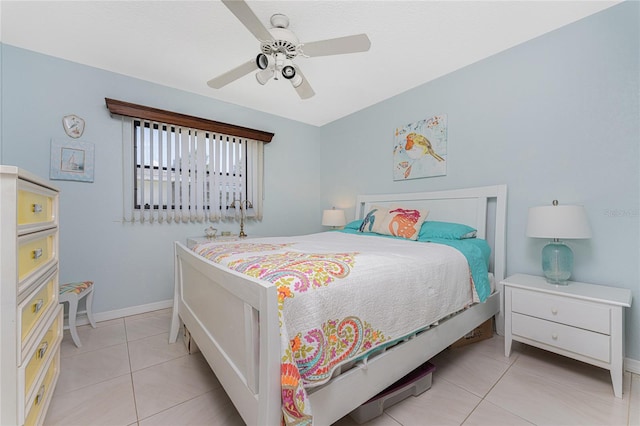 tiled bedroom with ceiling fan