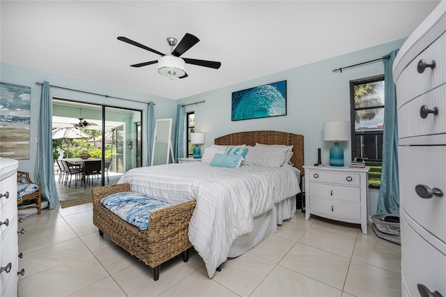 bedroom with ceiling fan, light tile patterned floors, and access to exterior