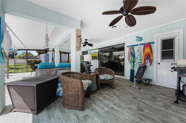 view of patio with a wooden deck and ceiling fan