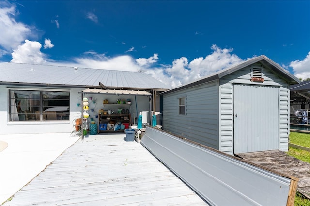 exterior space with a shed