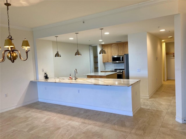 kitchen with appliances with stainless steel finishes, decorative light fixtures, and kitchen peninsula