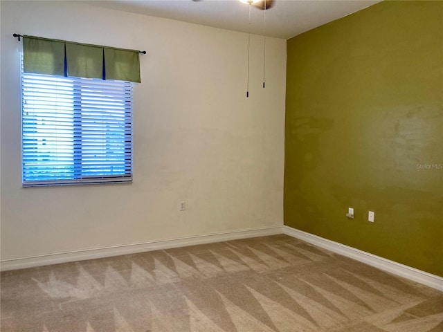 empty room featuring carpet flooring