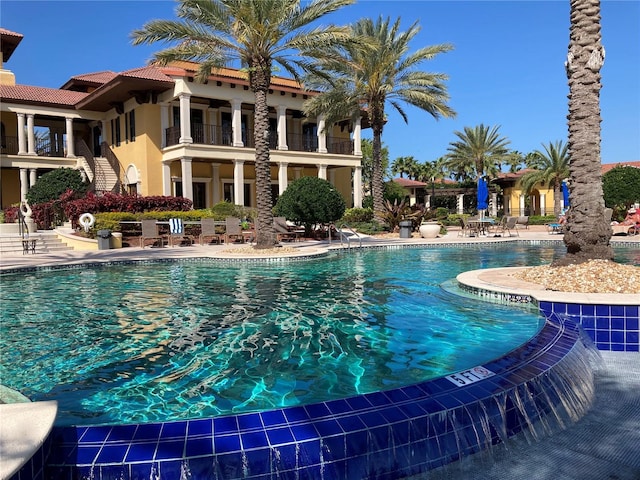 view of swimming pool featuring a patio