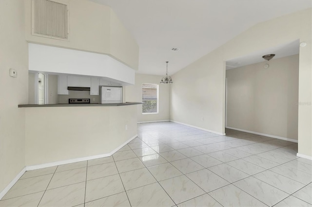 unfurnished living room with light tile patterned floors, vaulted ceiling, and a notable chandelier