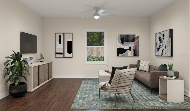 sitting room with dark hardwood / wood-style floors and ceiling fan