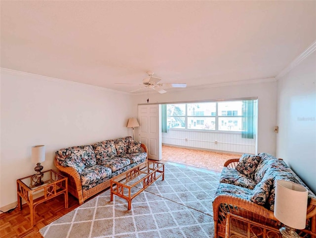 living room with crown molding, parquet floors, and ceiling fan