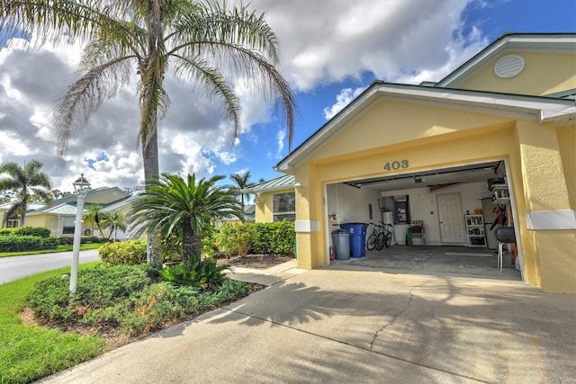 view of side of property with a garage