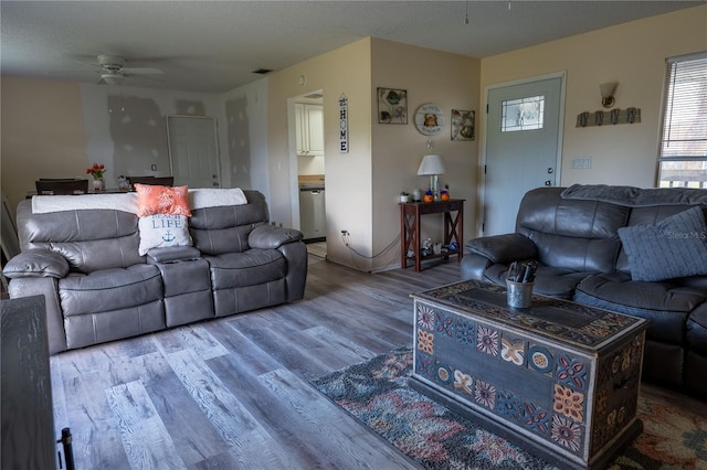 860 Columbia St, Port Charlotte, FL 33948 - living room with a ceiling fan and wood finished floors