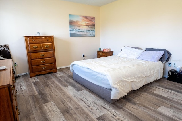 bedroom featuring hardwood / wood-style flooring