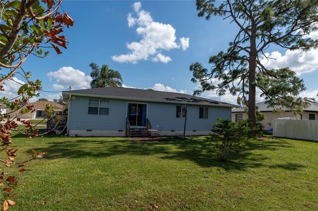 860 Columbia St, Port Charlotte, FL 33948 - rear view of house featuring entry steps and crawl space