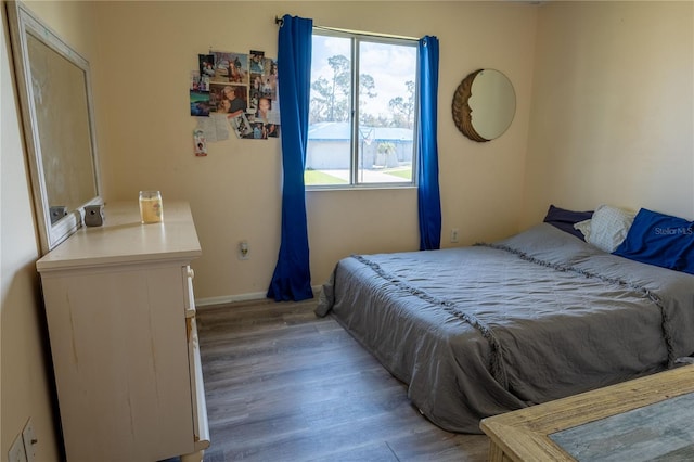 bedroom featuring hardwood / wood-style floors